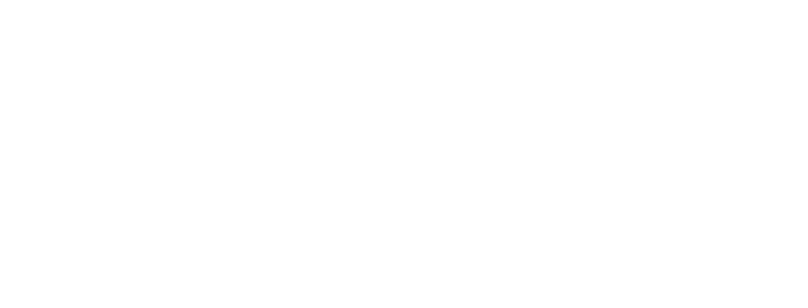 manchester at wesleyan white logo